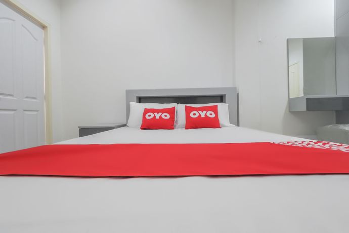 Imagen de la habitación del Hotel OYO 1159 Kandk Apartment. Foto 9