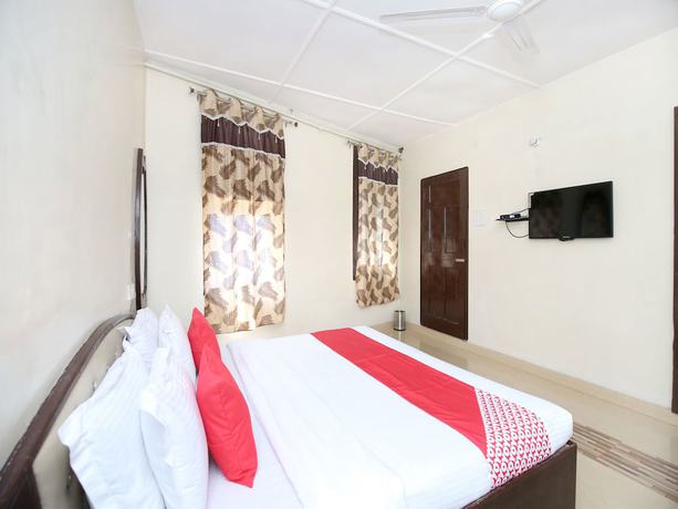 Imagen de la habitación del Hotel OYO 11595 Roxy. Foto 4