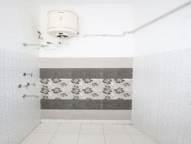 Imagen de la habitación del Hotel OYO 11595 Roxy. Foto 18