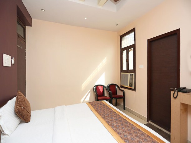 Imagen de la habitación del Hotel OYO 11596 Sanjay Guest House. Foto 3