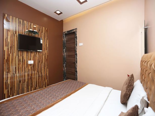 Imagen de la habitación del Hotel OYO 11596 Sanjay Guest House. Foto 6
