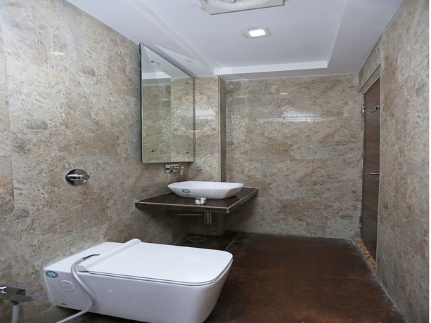 Imagen de la habitación del Hotel OYO 11596 Sanjay Guest House. Foto 9