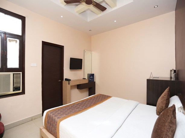 Imagen de la habitación del Hotel OYO 11596 Sanjay Guest House. Foto 11