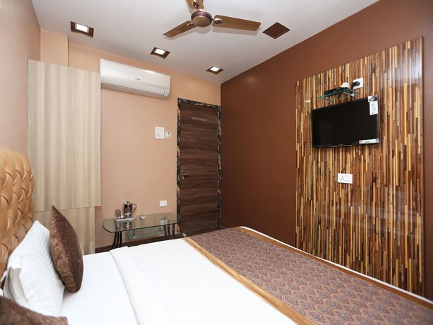 Imagen de la habitación del Hotel OYO 11596 Sanjay Guest House. Foto 13