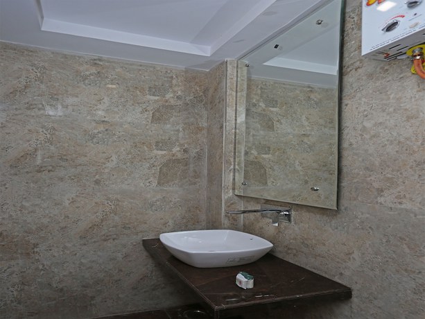 Imagen de la habitación del Hotel OYO 11596 Sanjay Guest House. Foto 15