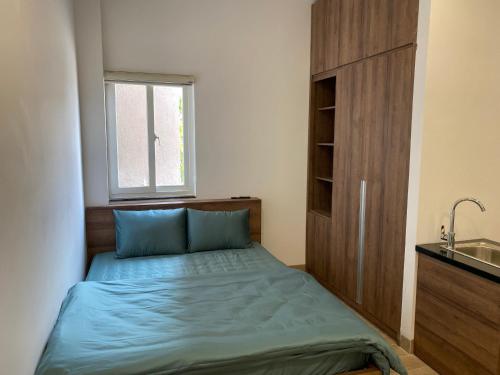 Imagen de la habitación del Hotel OYO 1161 Puchin And Apartment. Foto 18