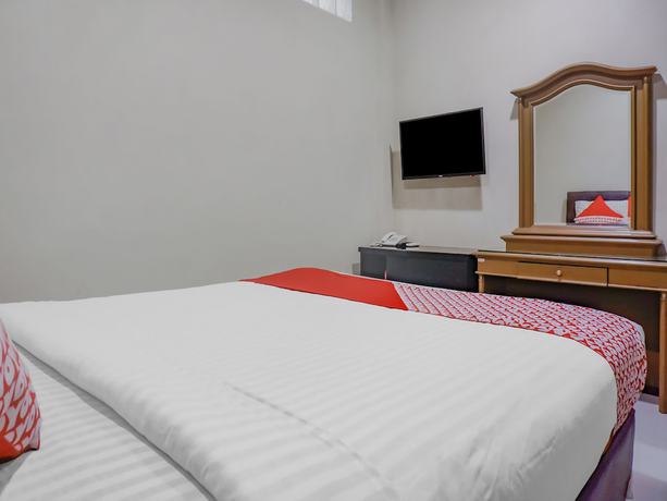 Imagen de la habitación del Hotel OYO 117 Blueberry Homestay. Foto 2