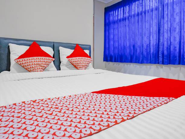 Imagen de la habitación del Hotel OYO 117 Blueberry Homestay. Foto 4