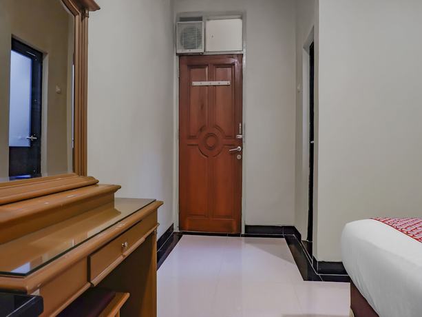 Imagen de la habitación del Hotel OYO 117 Blueberry Homestay. Foto 5
