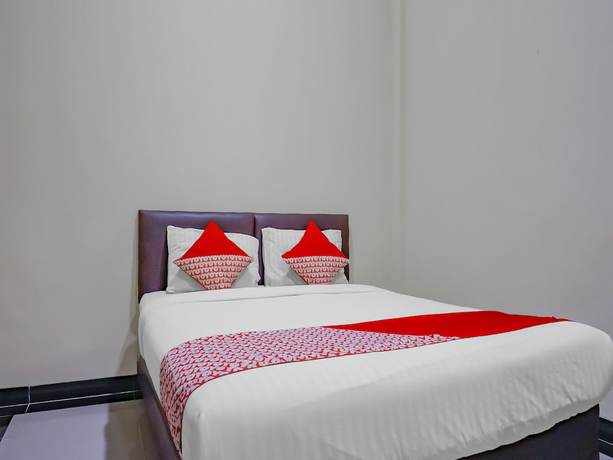 Imagen de la habitación del Hotel OYO 117 Blueberry Homestay. Foto 9
