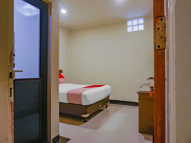 Imagen de la habitación del Hotel OYO 117 Blueberry Homestay. Foto 10