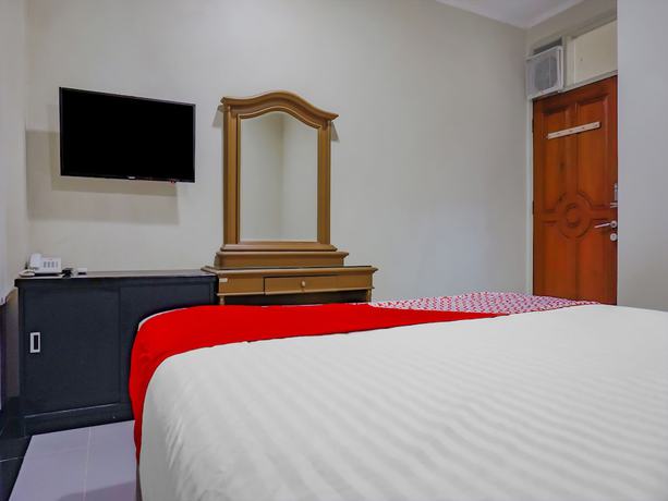 Imagen de la habitación del Hotel OYO 117 Blueberry Homestay. Foto 11