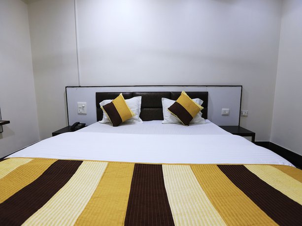 Imagen de la habitación del Hotel OYO 11840 Venus. Foto 9