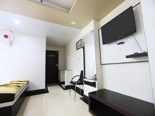Imagen de la habitación del Hotel OYO 11840 Venus. Foto 11