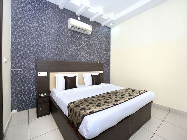 Imagen de la habitación del Hotel OYO 11844 Golden Halo. Foto 9