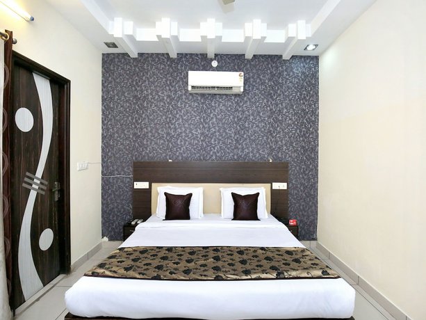 Imagen de la habitación del Hotel OYO 11844 Golden Halo. Foto 11