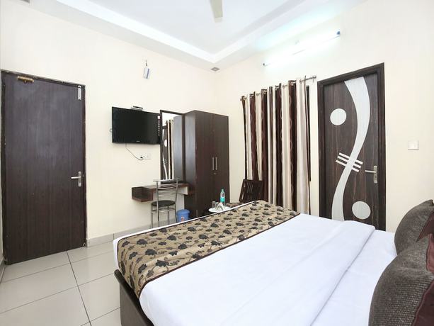 Imagen de la habitación del Hotel OYO 11844 Golden Halo. Foto 12