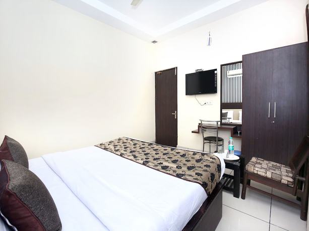 Imagen de la habitación del Hotel OYO 11844 Golden Halo. Foto 13