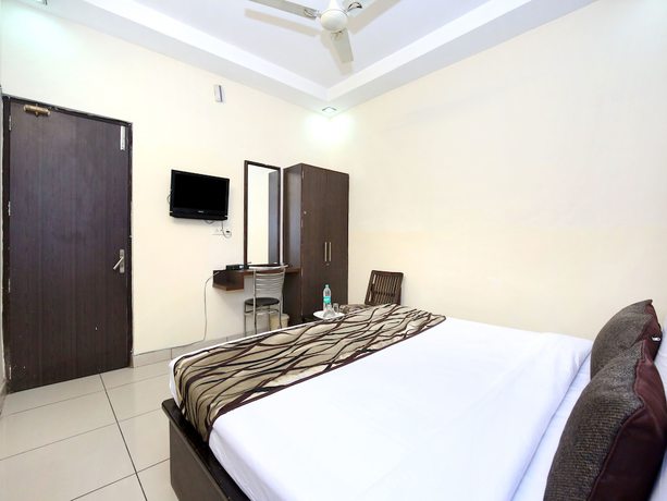 Imagen de la habitación del Hotel OYO 11844 Golden Halo. Foto 14