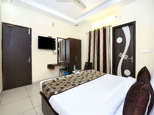 Imagen de la habitación del Hotel OYO 11844 Golden Halo. Foto 15