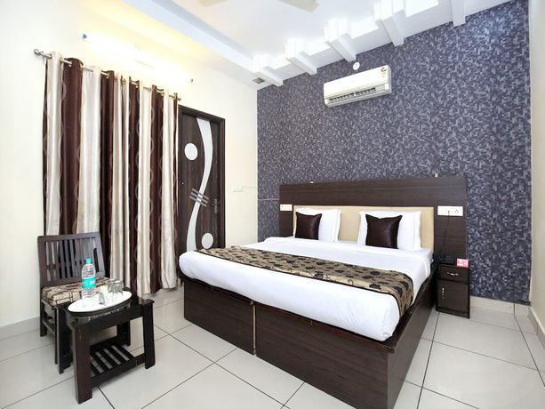 Imagen de la habitación del Hotel OYO 11844 Golden Halo. Foto 16