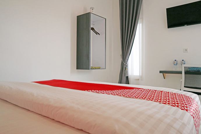 Imagen de la habitación del Hotel OYO 1185 Sachila Residence Syariah. Foto 2
