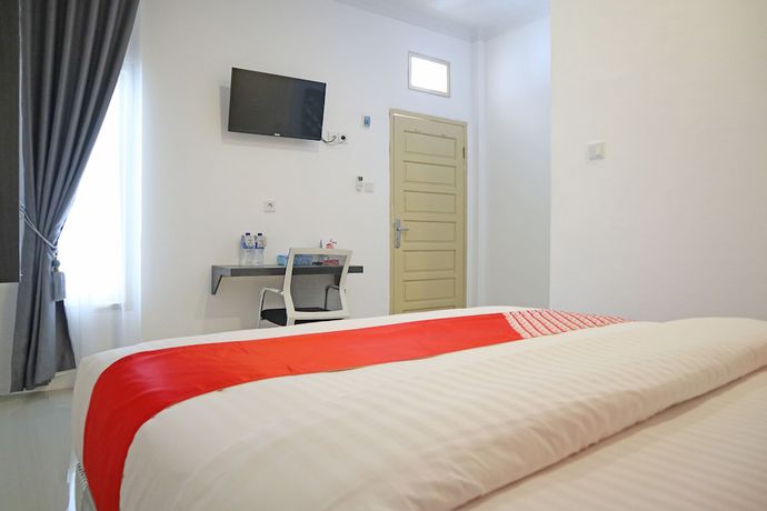 Imagen de la habitación del Hotel OYO 1185 Sachila Residence Syariah. Foto 3