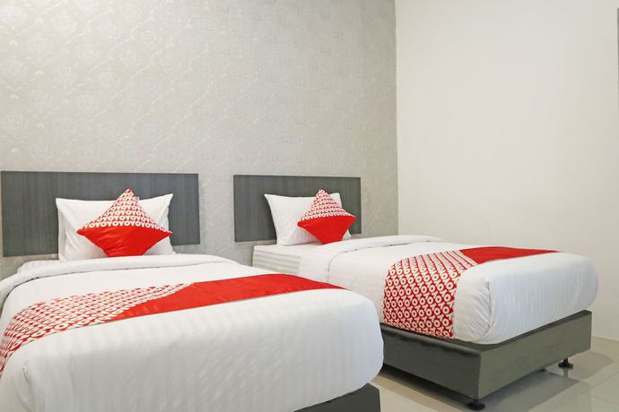 Imagen de la habitación del Hotel OYO 1185 Sachila Residence Syariah. Foto 6