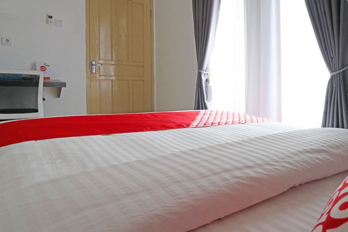 Imagen de la habitación del Hotel OYO 1185 Sachila Residence Syariah. Foto 8