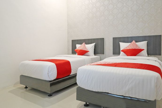 Imagen de la habitación del Hotel OYO 1185 Sachila Residence Syariah. Foto 10