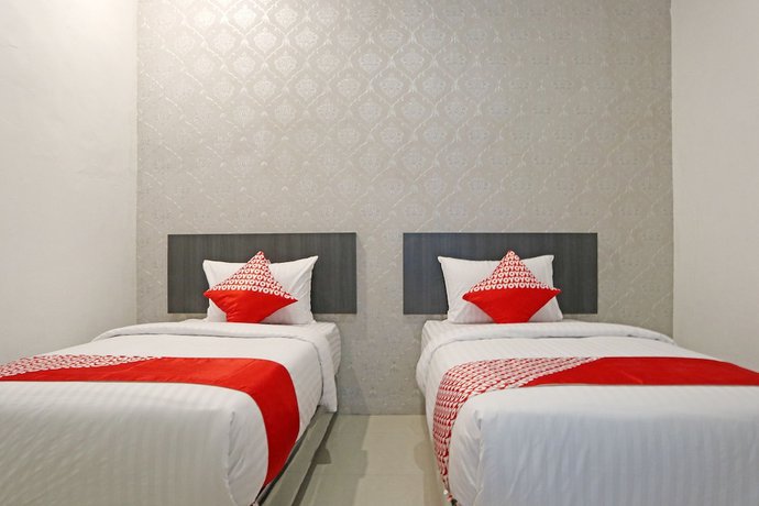 Imagen de la habitación del Hotel OYO 1185 Sachila Residence Syariah. Foto 11