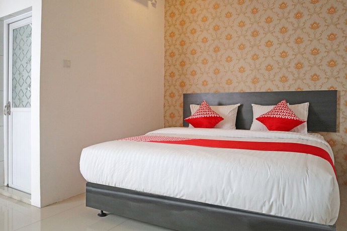 Imagen de la habitación del Hotel OYO 1185 Sachila Residence Syariah. Foto 12