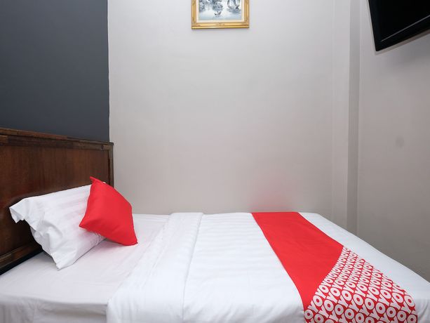 Imagen de la habitación del Hotel OYO 1190 Nice Stay Hotel. Foto 13