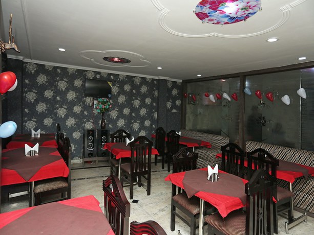 Imagen del bar/restaurante del Hotel OYO 11943 Yugantar Palace. Foto 2