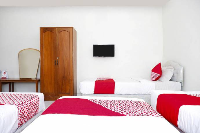 Imagen de la habitación del Hotel OYO 1196 Pura Puspa Rosa. Foto 5