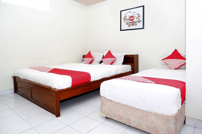 Imagen de la habitación del Hotel OYO 1196 Pura Puspa Rosa. Foto 6