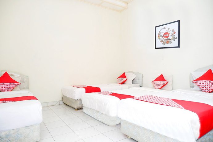 Imagen de la habitación del Hotel OYO 1196 Pura Puspa Rosa. Foto 7
