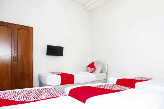 Imagen de la habitación del Hotel OYO 1196 Pura Puspa Rosa. Foto 9