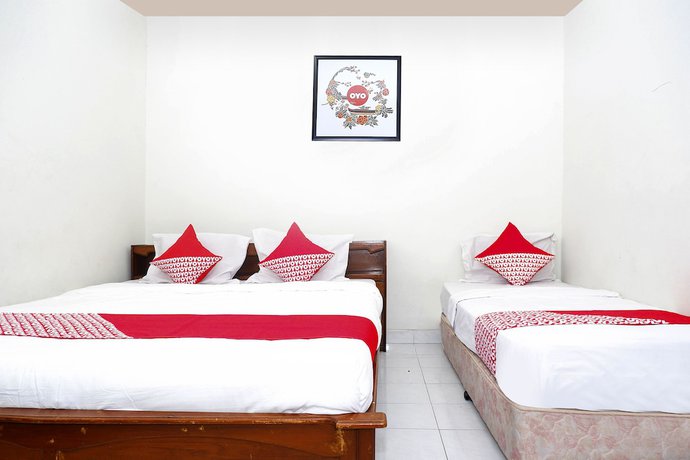 Imagen de la habitación del Hotel OYO 1196 Pura Puspa Rosa. Foto 10