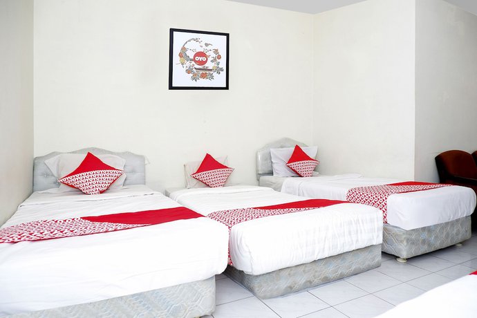 Imagen de la habitación del Hotel OYO 1196 Pura Puspa Rosa. Foto 11