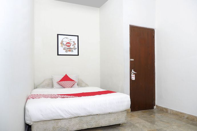 Imagen de la habitación del Hotel OYO 1196 Pura Puspa Rosa. Foto 14