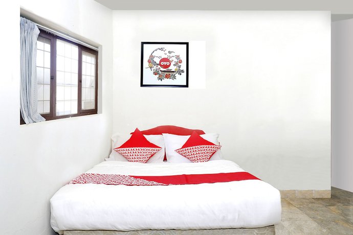 Imagen de la habitación del Hotel OYO 1196 Pura Puspa Rosa. Foto 15