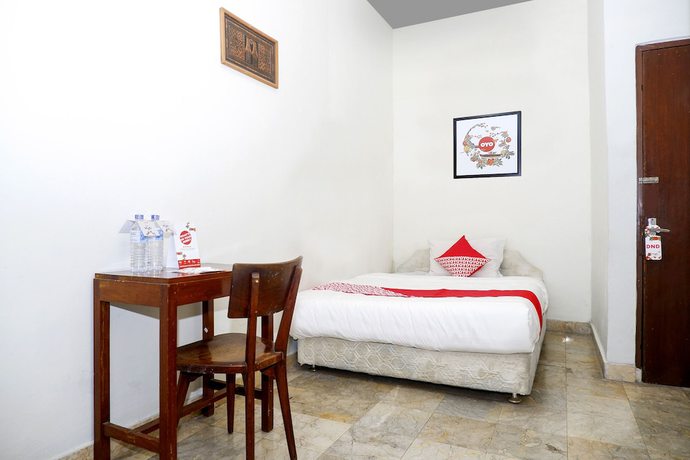Imagen de la habitación del Hotel OYO 1196 Pura Puspa Rosa. Foto 16