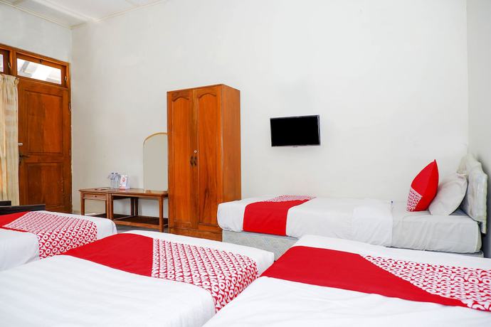 Imagen de la habitación del Hotel OYO 1196 Pura Puspa Rosa. Foto 17