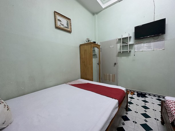 Imagen de la habitación del Hotel OYO 1206 Toan Thang Homestay. Foto 11