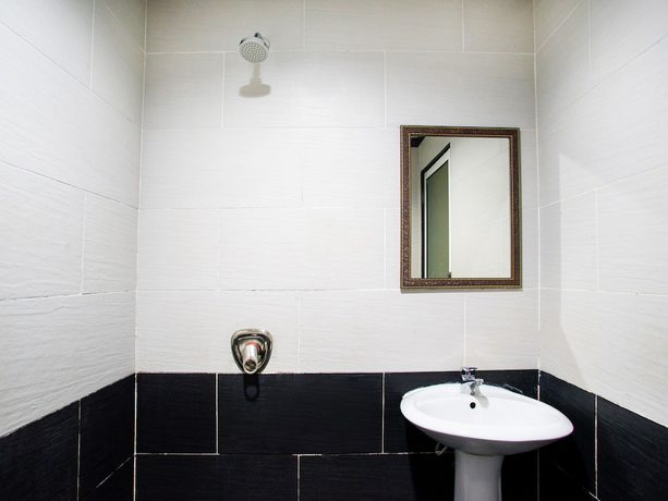 Imagen de la habitación del Hotel OYO 1219 Hotel BBK. Foto 12
