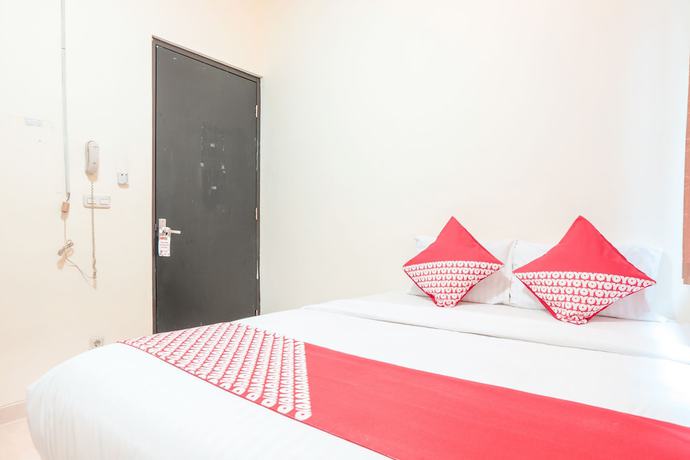 Imagen de la habitación del Hotel OYO 122 Oekude Kost. Foto 3