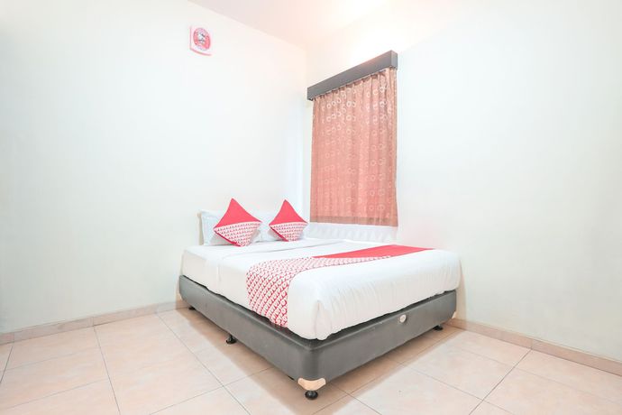 Imagen de la habitación del Hotel OYO 122 Oekude Kost. Foto 4