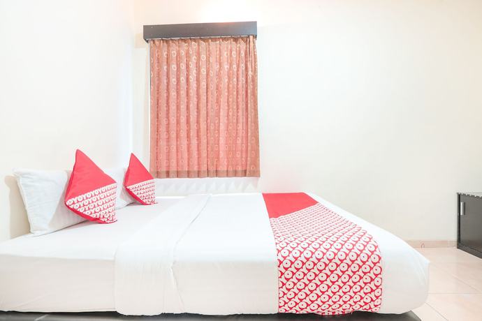 Imagen de la habitación del Hotel OYO 122 Oekude Kost. Foto 5