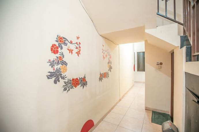 Imagen de los interiores del Hotel OYO 122 Oekude Kost. Foto 17